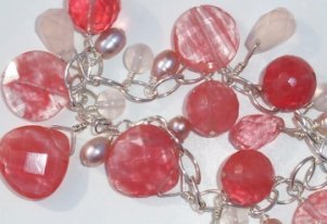 Photo of bracelet made with faceted cherry quartz beads