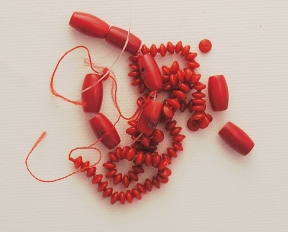 Photo of red coral beads