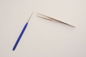 Photo of jewelry awl and jewelry tweezers